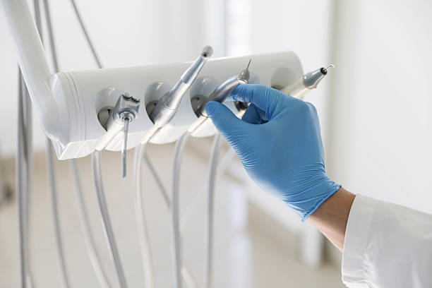 Professional Tooth Extraction technician working in Simonton Lake, IN